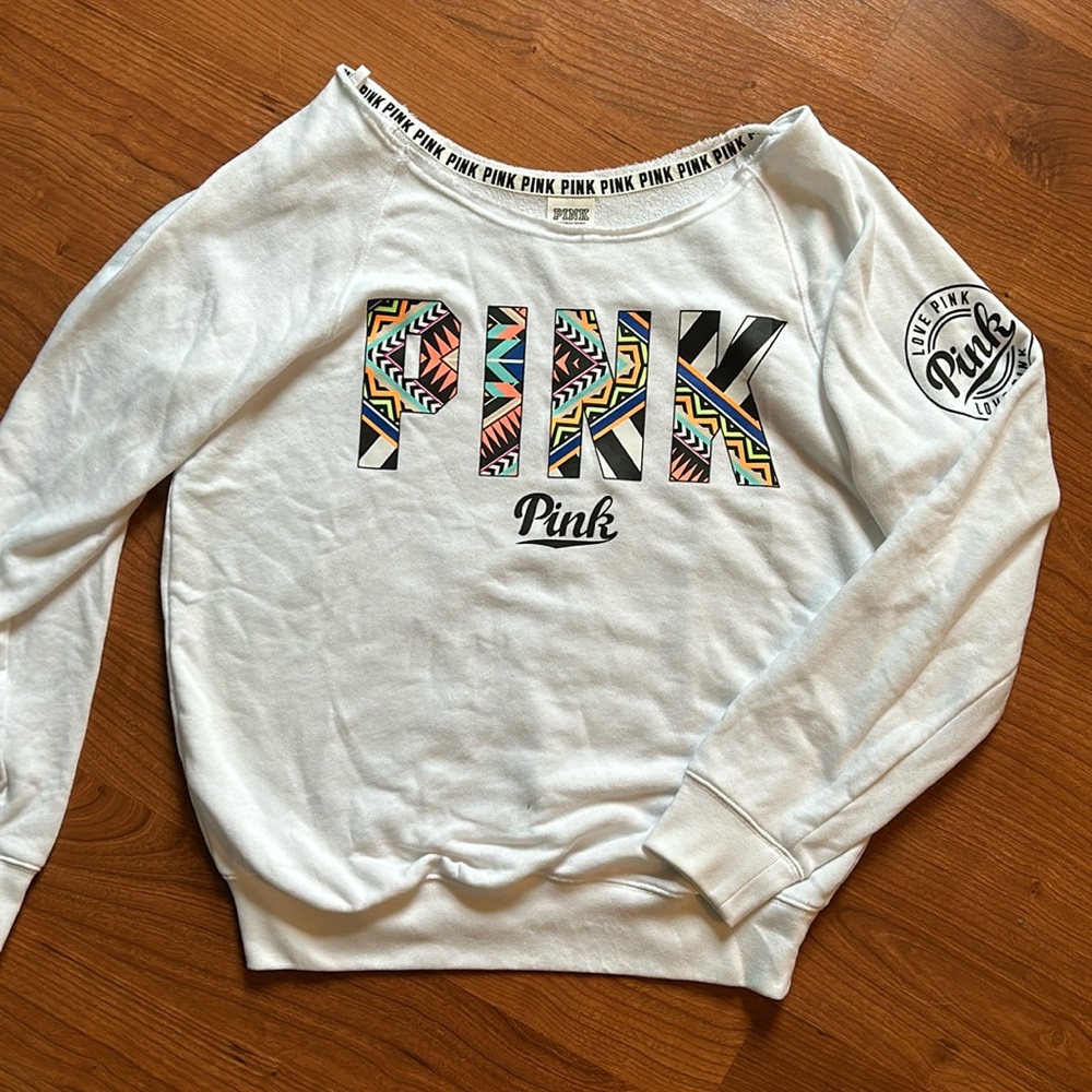 White sweatshirt from pink